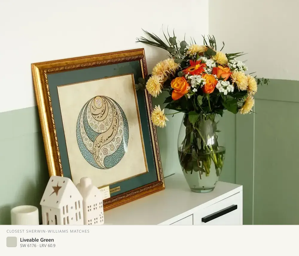 Sage green with white cabinetry