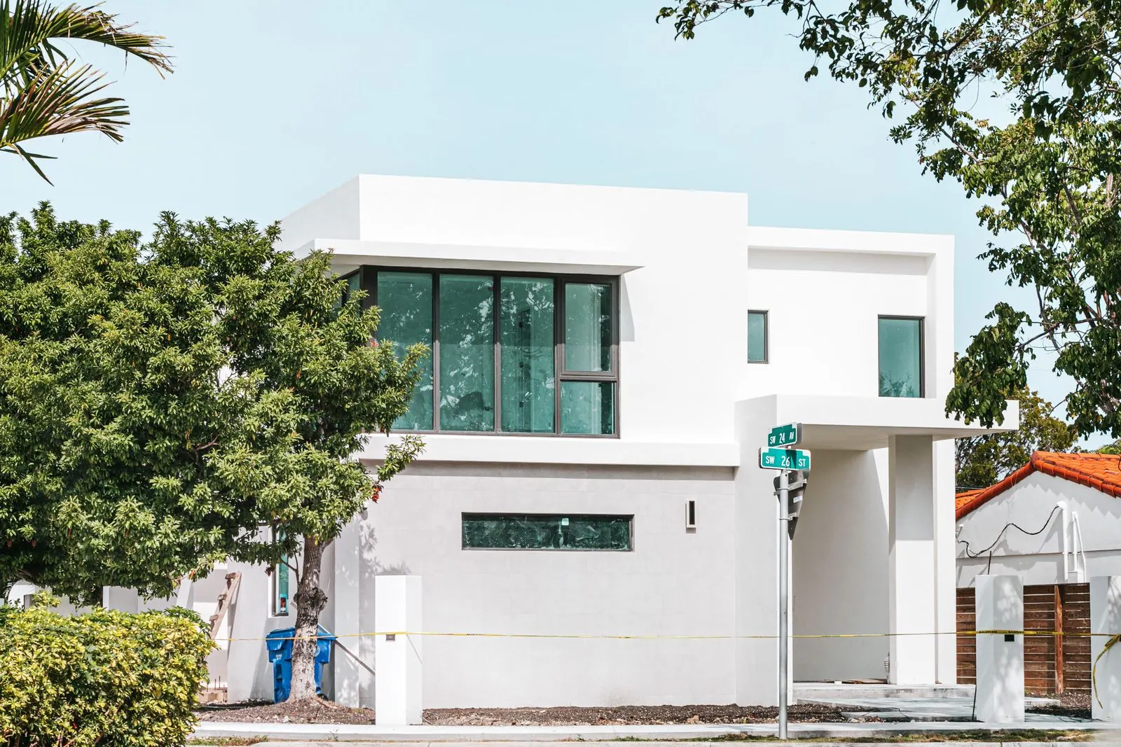Modern white house with large windows in Miami